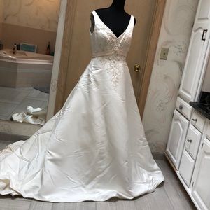 Winter ivory satin cathedral length wedding gown